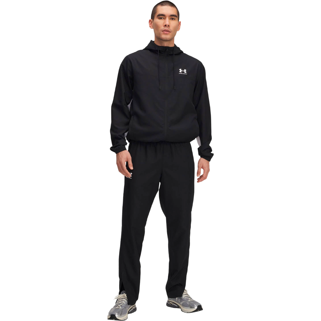 PANTALÓN BUZO UNDER ARMOUR RIVAL WOVEN HOMBRE | 1390150-001